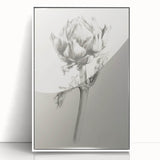 Framed acrylic artwork showcasing an abstract floral design in vibrant colors, set against a white background, perfect for modern home decor.