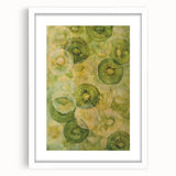 Abstract art print featuring assorted fruits in vibrant colors on a white framed mat.