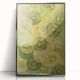 Mid-century modernist art featuring an array of colorful fruits on a silver-framed acrylic print.