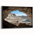 Framed canvas artwork showcasing a dramatic landscape with caves, featuring a black side view that enhances its depth and visual appeal, perfect for home decor.