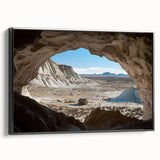 Framed canvas artwork showcasing a dramatic landscape with caves, featuring a black side view that enhances its depth and visual appeal, perfect for home decor.