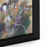 Close-up of a framed abstract canvas featuring vibrant splatter designs in shades of blue, orange, and yellow, showcasing modern art for contemporary decor.