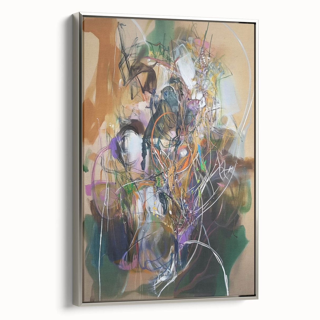 Abstract splatter art canvas framed in silver, showcasing vibrant colors and dynamic patterns. Ideal for modern decor, adding a creative touch to any space.