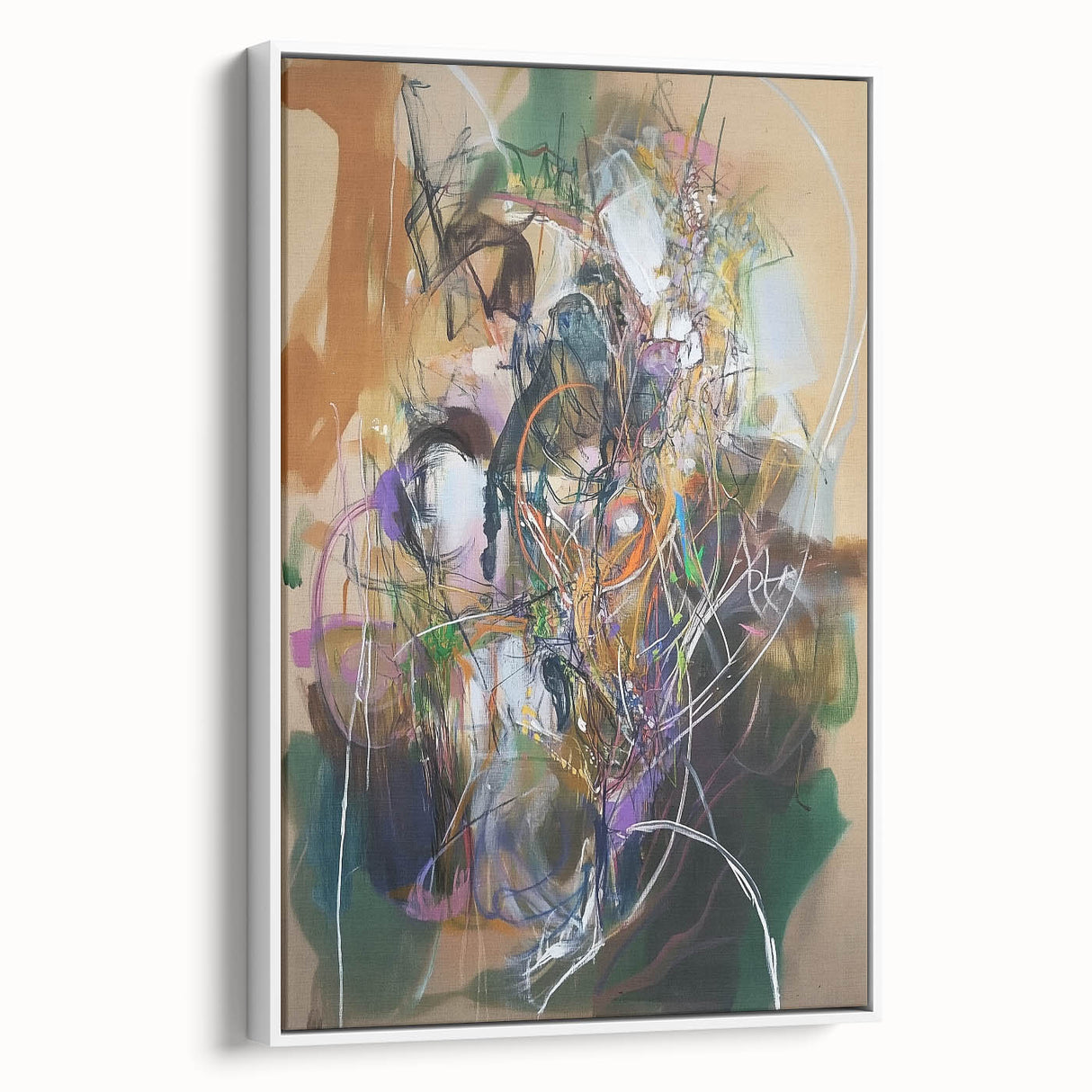 Framed canvas artwork showcasing vibrant abstract splatters in a white setting, ideal for modern home decor, adding a pop of color and creativity to any room.