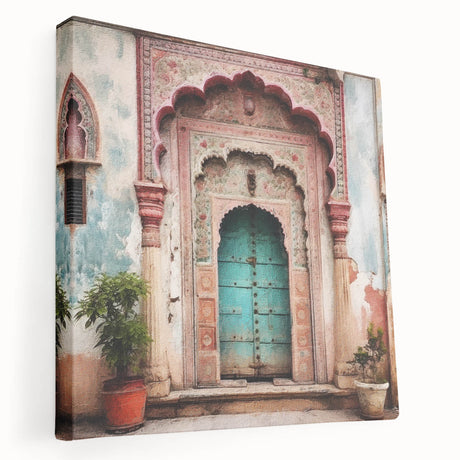 Large art depicting a traditional Indian door design in vibrant red and orange tones on stretched canvas.