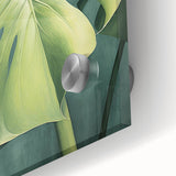 Close-up of vibrant floral and botanical wall art design printed on acrylic glass, showcasing intricate details of colorful flowers and green leaves against a contemporary backdrop, perfect for modern home decor.