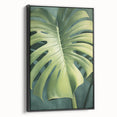 Framed wall art featuring a floral and botanical design with vibrant colors, showcasing black leaves and flowers, set against a modern backdrop. Ideal for home decor.