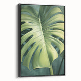 Framed wall art featuring a floral and botanical design with vibrant colors, showcasing black leaves and flowers, set against a modern backdrop. Ideal for home decor.