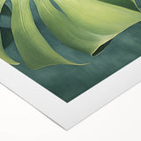 Rolled canvas wall art showcasing a vibrant floral design with intricate leaves, perfect for home decor, presented in a protective cardboard tube.