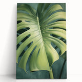 Vibrant floral wall art canvas featuring an array of colorful flowers and lush green leaves, elegantly leaning against a neutral wall, perfect for home decor.