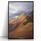 Framed acrylic artwork depicting a stunning desert landscape, showcasing vibrant colors and intricate details, presented in a sleek black frame. Perfect for modern decor.