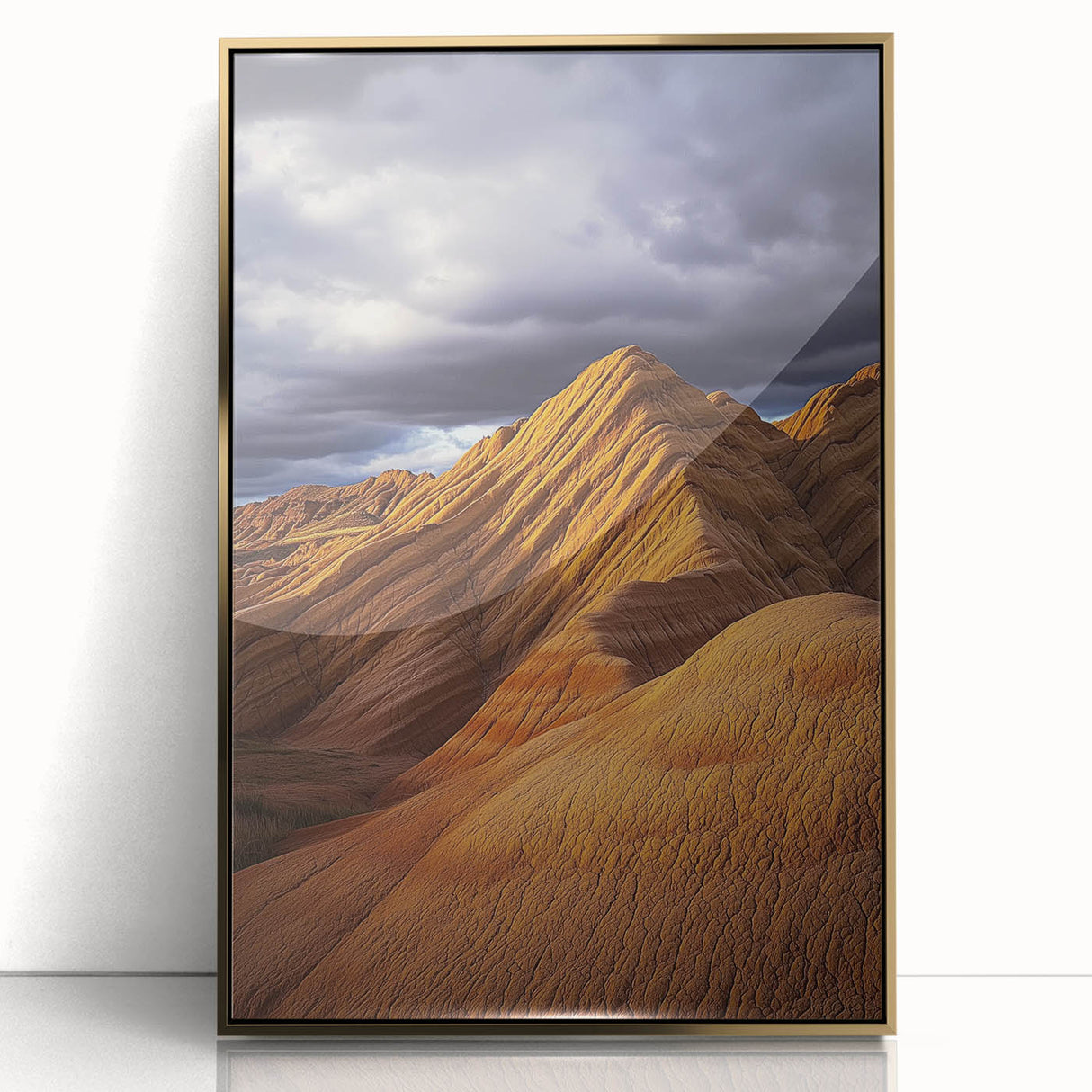 Framed acrylic artwork depicting a vibrant desert landscape with warm gold accents, showcasing a serene sunset and textured details for an elegant home decor touch.