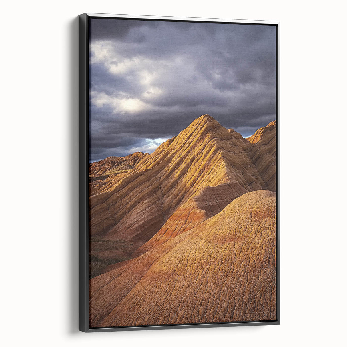 Framed canvas artwork depicting a serene desert landscape with warm hues and intricate textures, showcased from a black side view, ideal for modern home decor.
