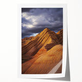 Desert landscape rolled print showcasing vibrant hues of orange and yellow, highlighting the serene beauty of arid terrain, perfect for stylish home decor.