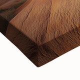 Close-up of a stretched canvas artwork depicting a vibrant desert landscape, showcasing warm tones of orange and yellow with intricate details, perfect for home decor.