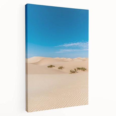 Stretched canvas artwork depicting a serene landscape of sand dunes under a vibrant sunset, showcasing warm hues of orange and gold, ideal for modern home decor.