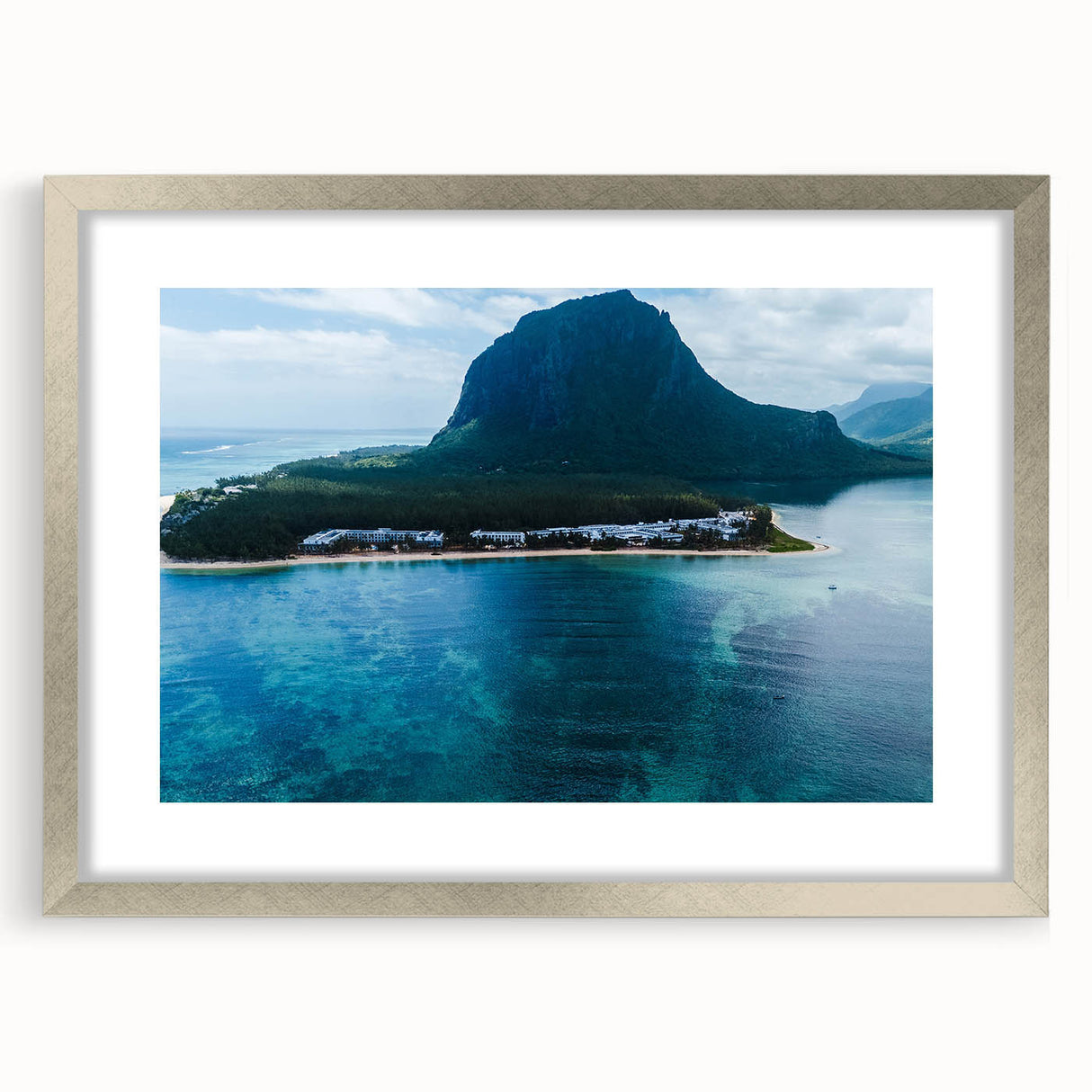 Abstract art print of a Mauritius landscape in muted earth tones on a framed silver mat, suitable for dining room decor.