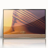 Acrylic print of a Namibian landscape in muted earth tones, framed in silver, suitable as modern art wall decor.
