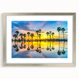 Textured art print depicting an abstract scenery in muted earth tones, framed in silver, ideal for bedroom art.