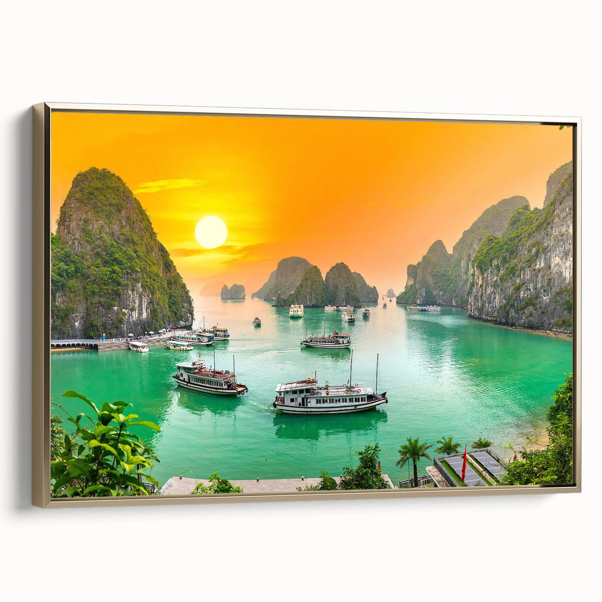Framed canvas featuring a vintage-style landscape painting of a Vietnamese scenery in gold and black tones.