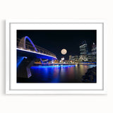 Extra large abstract art print of Perth, Australia, in muted earth tones on a textured canvas, framed in white.