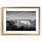 Abstract art print of a Caribbean scene in muted blue and green, framed in gold, ideal for dining room decor.