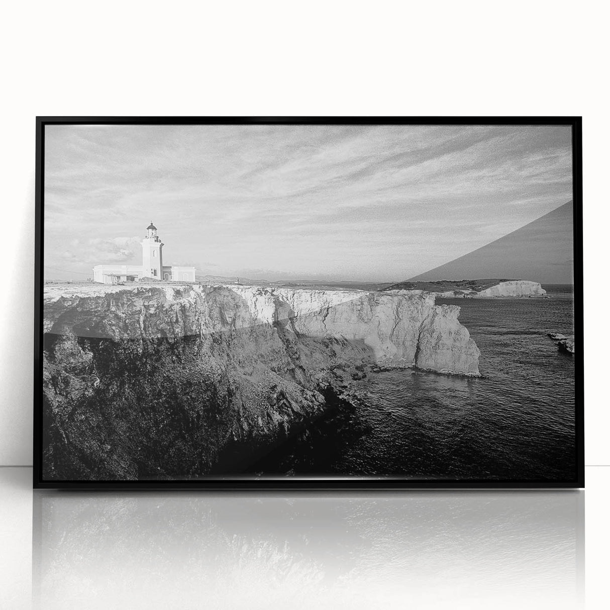 Large abstract wall art of a Caribbean scene in muted blue and green tones on a framed acrylic.