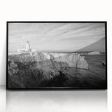 Large abstract wall art of a Caribbean scene in muted blue and green tones on a framed acrylic.