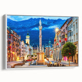 Framed canvas featuring a vintage-style landscape art painting of an Austrian scenery in colorful hues.