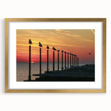 Abstract art print of a European scenery in muted earth tones on a framed canvas, suitable for dining room decor.