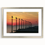 Extra large abstract art print of a textured European scenery in muted earth tones, framed in silver.