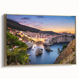 Framed canvas depicting a vintage-style landscape of a Croatian coastline in muted gold and black tones.
