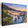 Landscape painting of a European village in Croatia on stretched canvas, featuring muted earth tones.