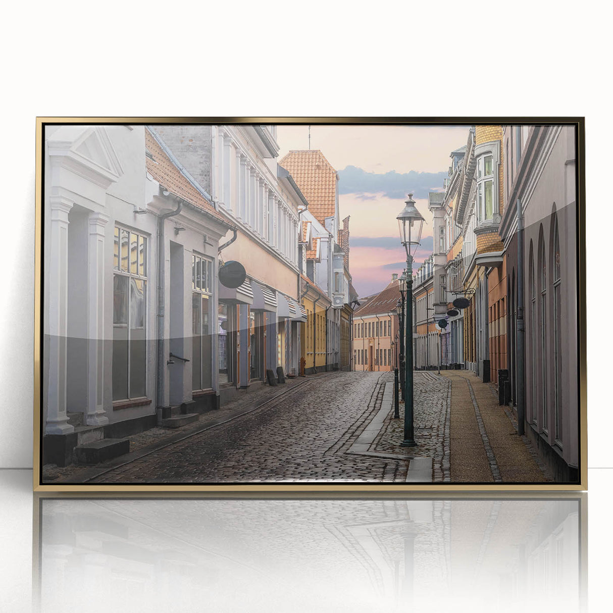 Art deco poster depicting a serene European landscape, in muted gold and blue tones, framed in acrylic.
