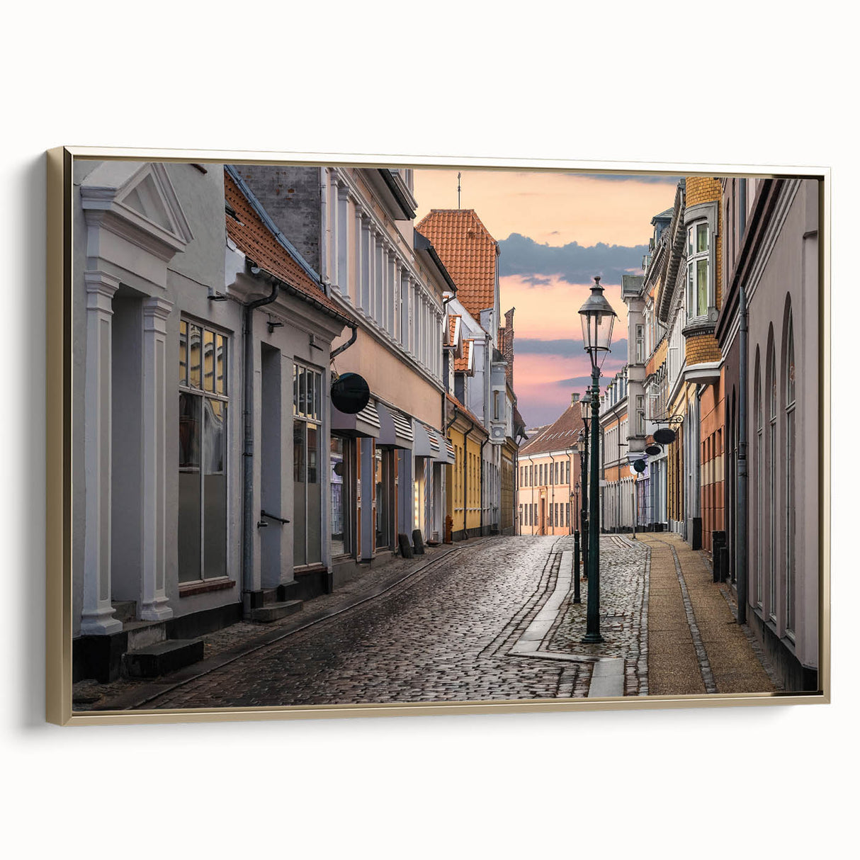 Framed canvas depicting a vintage European landscape in black and gold tones, suitable for bedroom wall art.