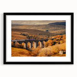 Extra large abstract art print featuring colorful, textured scenery of Cumbria, England on a black framed canvas.