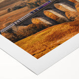 Art deco poster depicting a serene Cumbrian landscape in soft green and blue tones on rolled canvas.