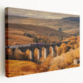 Large stretched canvas depicting a serene Cumbrian landscape in muted green and blue tones, ideal for kitchen wall art.