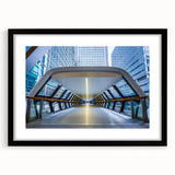 Colorful abstract art print of London scenery in vibrant hues on a large textured canvas, framed in black.