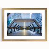 Abstract art print of London scenery in muted gold and black tones, framed with a gold mat.