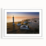 Textured abstract art print of a European scenery in muted earth tones, framed with a white mat, suitable for bedroom decor.