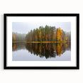 Extra large abstract art print depicting a colorful, textured Finnish landscape, in a black frame with mat.