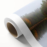 Art deco poster of a serene Finnish landscape in muted green and blue tones, ideal for nursery wall art.