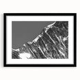 Extra large abstract art print of the French Alps in vibrant colors on textured canvas, framed in black.