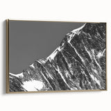 Framed canvas depicting a vintage-style landscape of the French Alps in muted gold and black tones.