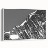 Vintage poster art of the French Alps in colorful hues on a large framed canvas, suitable for living room decor.