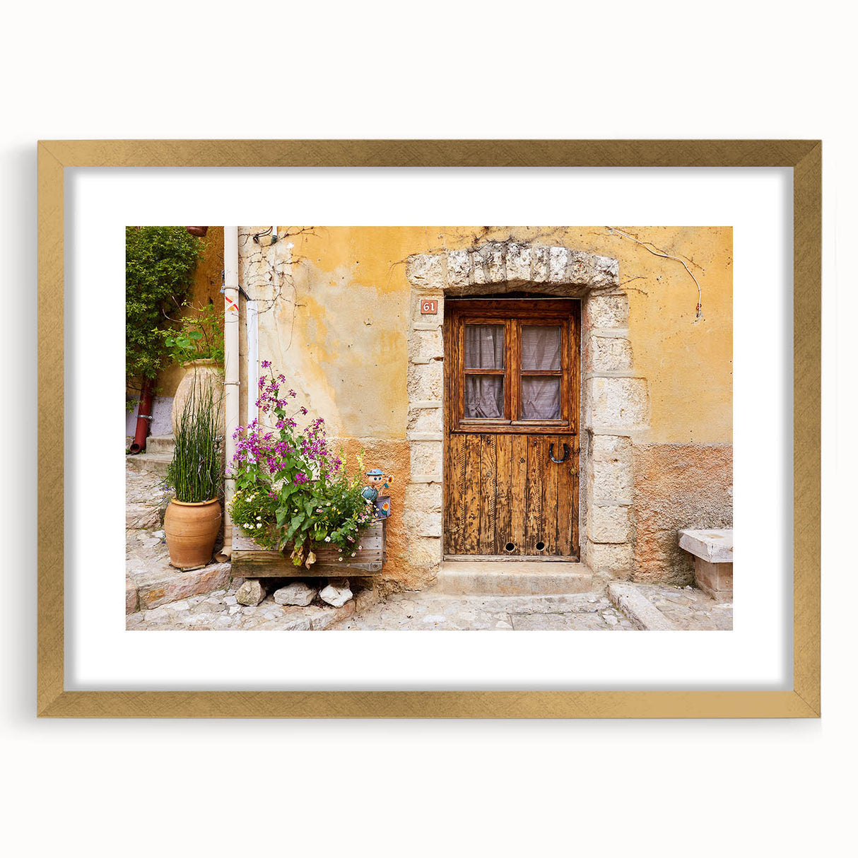 Abstract art print of a Provence landscape in muted earth tones, framed in gold, suitable for dining room decor.