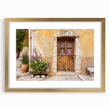 Abstract art print of a Provence landscape in muted earth tones, framed in gold, suitable for dining room decor.