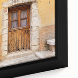 Extra large framed canvas featuring a textured depiction of a Provencal landscape in black with colorful accents.