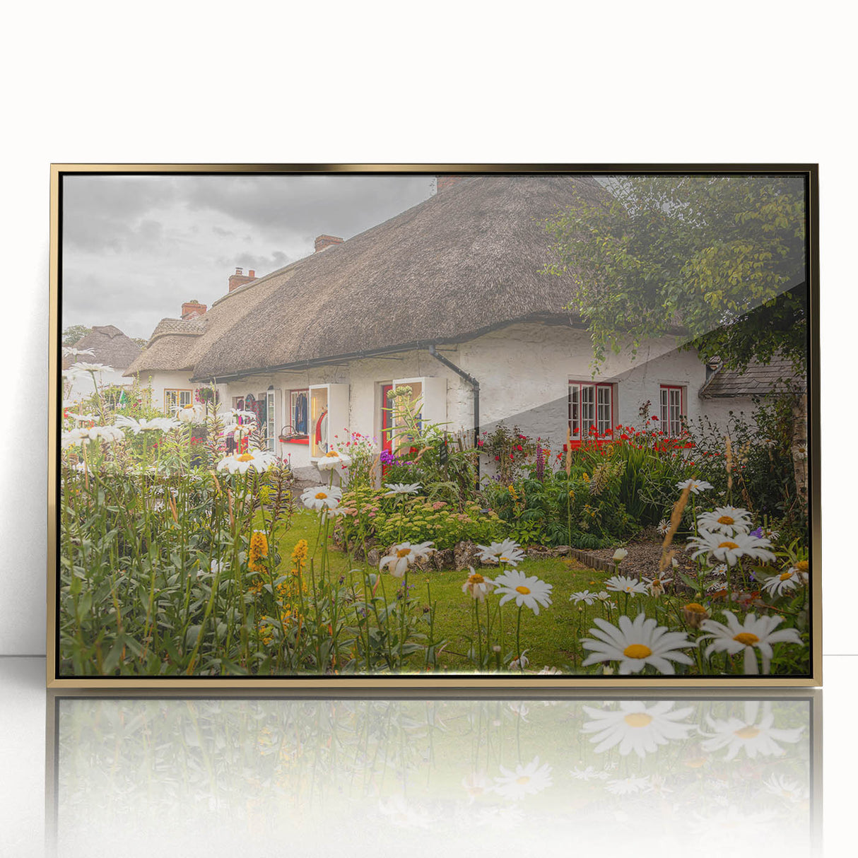 Large art print of a scenic Irish landscape in muted green and blue tones on a framed acrylic.